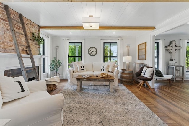 4 Porter St, Granby, MA 01033 - living area featuring wood finished floors, beamed ceiling, and recessed lighting