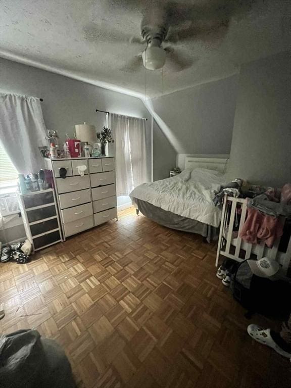 31 Abbott St, Lowell, MA 01852 - bedroom with vaulted ceiling, a textured ceiling, and a ceiling fan