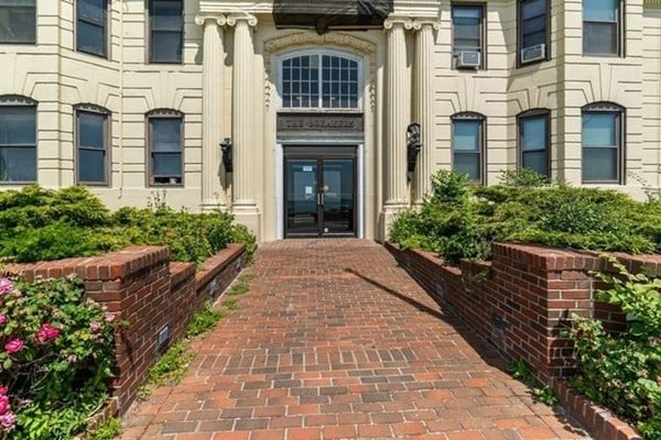 view of exterior entry featuring french doors