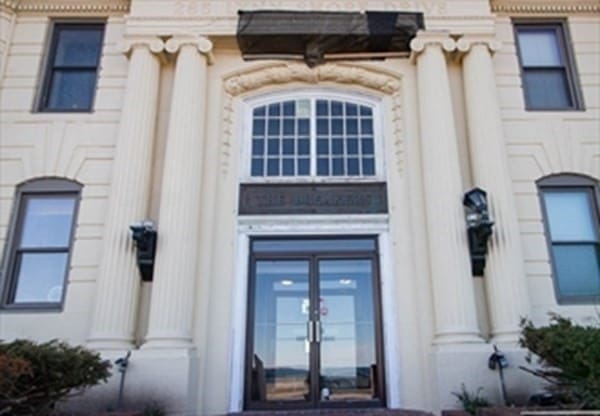 view of exterior entry featuring french doors