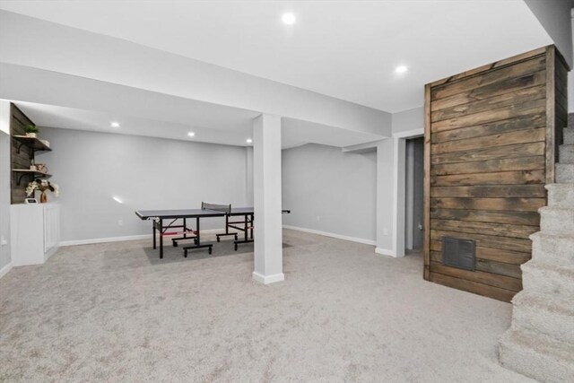 playroom featuring light carpet, recessed lighting, and baseboards