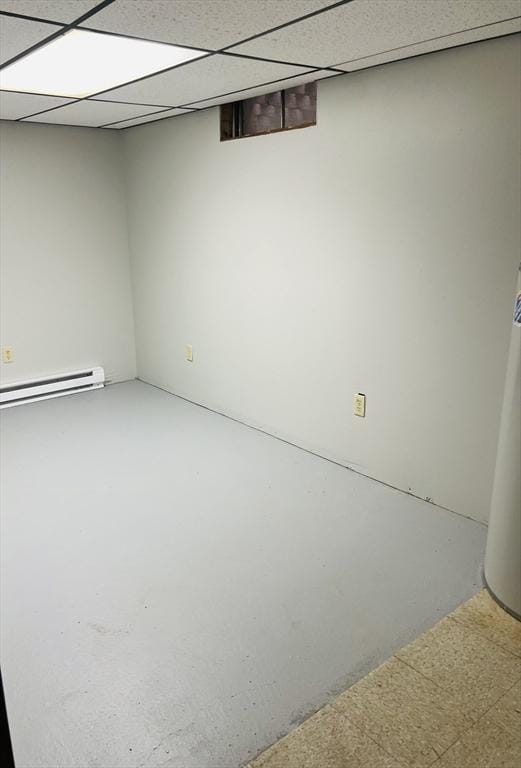209 Casey Dr, Chicopee, MA 01020 - finished below grade area with baseboard heating and a paneled ceiling