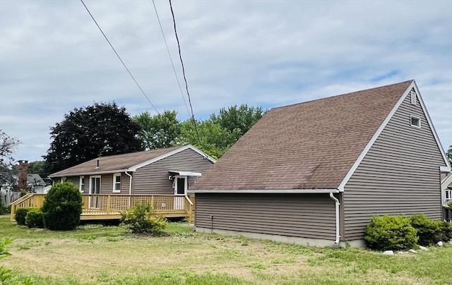 209 Casey Dr, Chicopee, MA 01020 - back of property featuring a wooden deck and a shingled roof