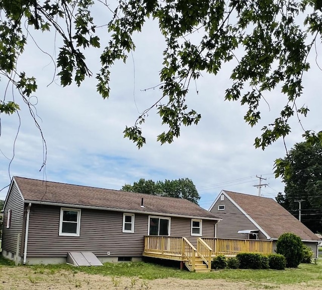 209 Casey Dr, Chicopee, MA 01020 - back of property featuring a wooden deck and a shingled roof