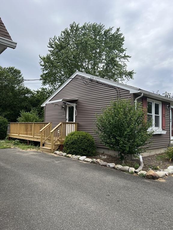 209 Casey Dr, Chicopee, MA 01020 - view of front of house with a deck