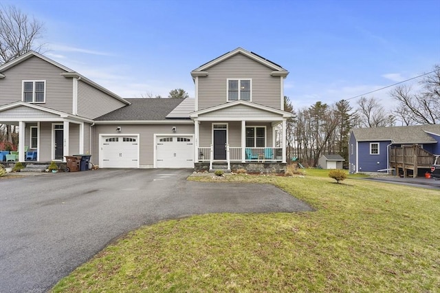 10 Stone St Unit 1, Auburn, MA 01501 - traditional-style home with a garage, aphalt driveway, a front lawn, and covered porch