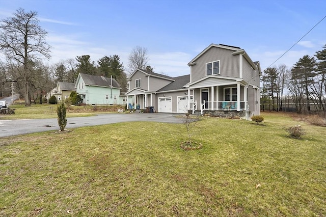 10 Stone St Unit 1, Auburn, MA 01501 - traditional-style house featuring a front yard, a porch, an attached garage, and aphalt driveway
