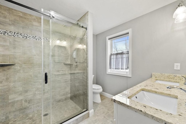 10 Stone St Unit 1, Auburn, MA 01501 - full bathroom with toilet, double vanity, a sink, and a shower stall