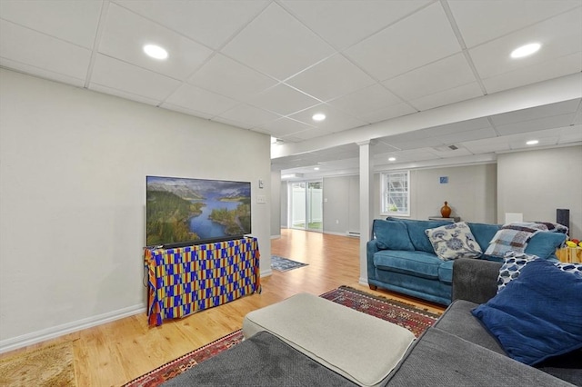 10 Stone St Unit 1, Auburn, MA 01501 - living room with baseboards, a drop ceiling, and wood finished floors
