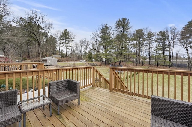 10 Stone St Unit 1, Auburn, MA 01501 - wooden terrace featuring a storage shed, an outbuilding, and a yard