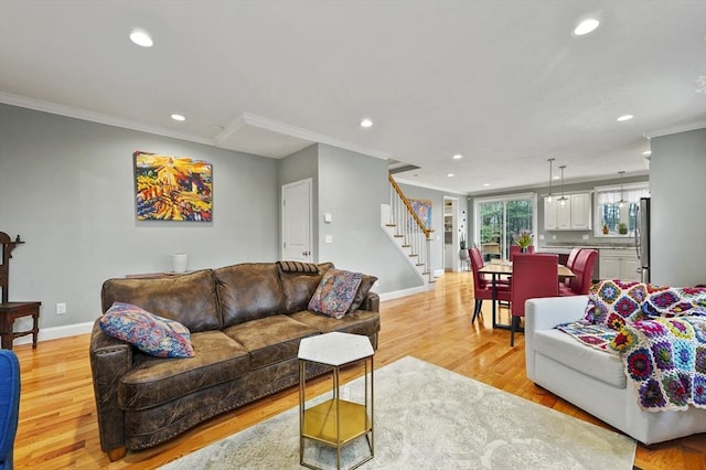 10 Stone St Unit 1, Auburn, MA 01501 - living room featuring baseboards, ornamental molding, recessed lighting, stairs, and light wood finished floors