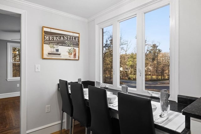 92 Martin St, Rehoboth, MA 02769 - dining room featuring plenty of natural light, crown molding, and wood finished floors