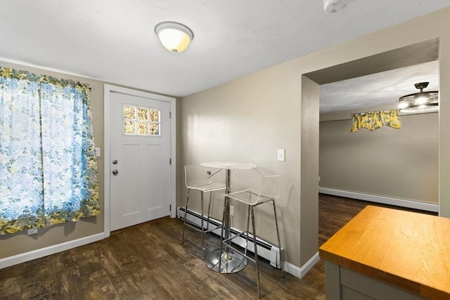 92 Martin St, Rehoboth, MA 02769 - foyer entrance featuring a baseboard heating unit and wood finished floors
