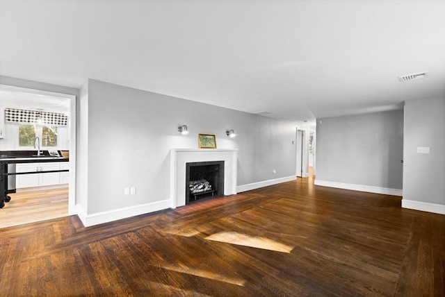 92 Martin St, Rehoboth, MA 02769 - unfurnished living room with a fireplace and wood finished floors