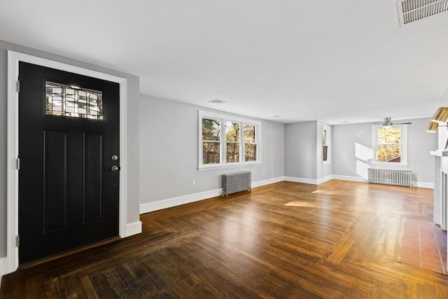 92 Martin St, Rehoboth, MA 02769 - entrance foyer with radiator, healthy amount of natural light, and wood finished floors