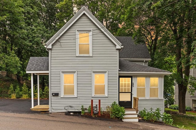25 Norfolk St, Canton, MA 02021 - view of front of house with roof with shingles