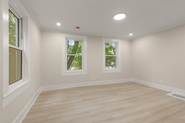 25 Norfolk St, Canton, MA 02021 - empty room featuring light wood-style flooring, ornamental molding, and recessed lighting
