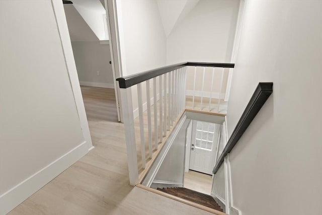 25 Norfolk St, Canton, MA 02021 - stairs with wood finished floors and baseboards