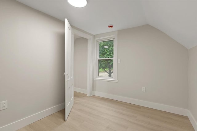 25 Norfolk St, Canton, MA 02021 - additional living space with light wood-type flooring and vaulted ceiling