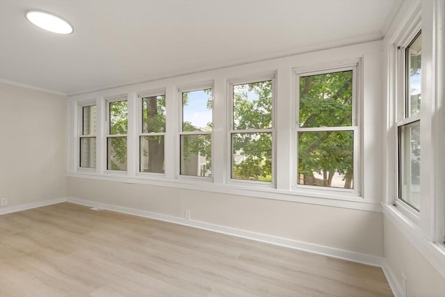 25 Norfolk St, Canton, MA 02021 - unfurnished sunroom featuring healthy amount of natural light, wood finished floors, and ornamental molding