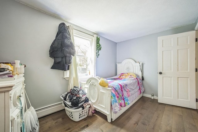 14 Greenville St, Billerica, MA 01821 - bedroom with baseboards, a baseboard radiator, and hardwood / wood-style flooring