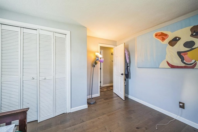 14 Greenville St, Billerica, MA 01821 - bedroom featuring a closet, baseboards, and dark wood-style floors
