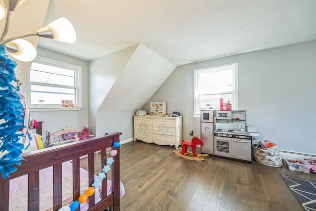 14 Greenville St, Billerica, MA 01821 - bedroom featuring wood-type flooring, vaulted ceiling, and multiple windows