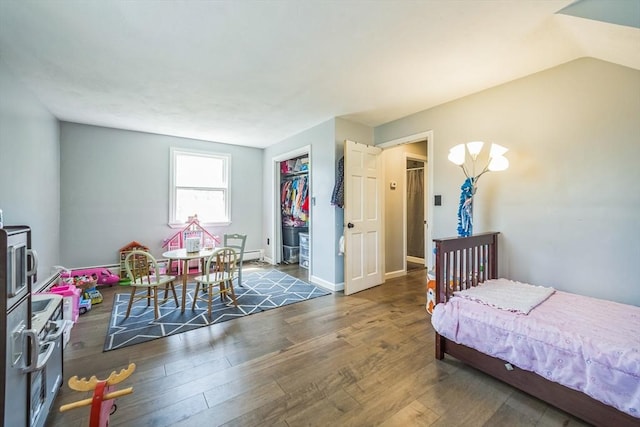14 Greenville St, Billerica, MA 01821 - bedroom featuring baseboards, a closet, and hardwood / wood-style flooring