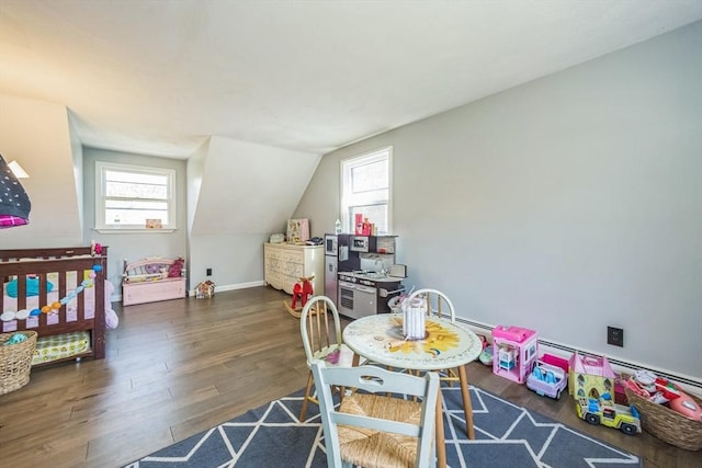 14 Greenville St, Billerica, MA 01821 - rec room featuring baseboards, lofted ceiling, wood finished floors, and a wealth of natural light