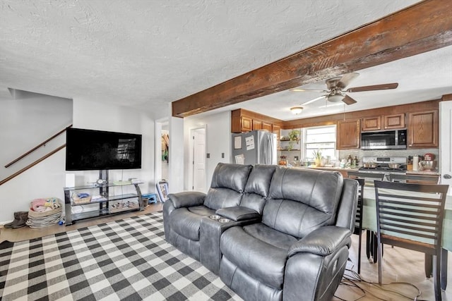 14 Greenville St, Billerica, MA 01821 - living area featuring a textured ceiling, ceiling fan, and beam ceiling