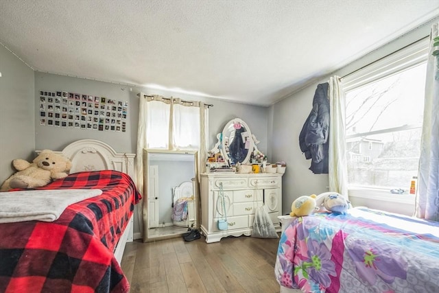 14 Greenville St, Billerica, MA 01821 - bedroom featuring a textured ceiling and hardwood / wood-style floors