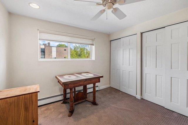 office area with a ceiling fan, light colored carpet, baseboards, a baseboard radiator, and recessed lighting