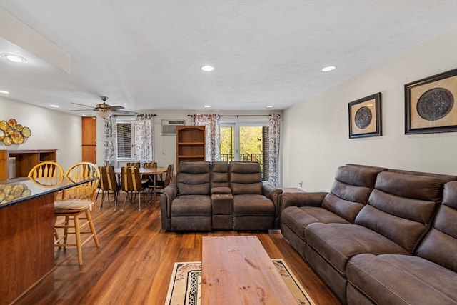 living room featuring recessed lighting, ceiling fan, and wood finished floors