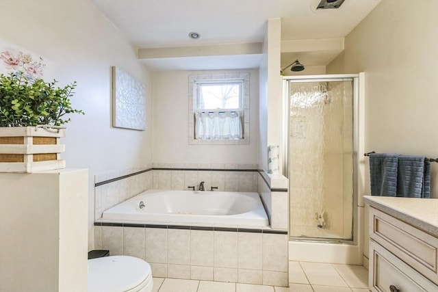 full bathroom with tile patterned floors, toilet, independent shower and bath, and vanity