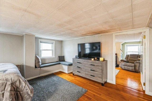 bedroom featuring wood-type flooring