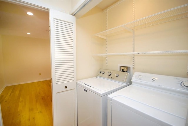 19 Concord Greene Unit 3, Concord, MA 01742 - laundry area featuring washer and dryer, light wood-style floors, and recessed lighting