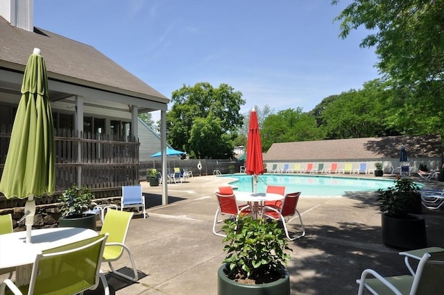 19 Concord Greene Unit 3, Concord, MA 01742 - view of patio / terrace featuring a community pool and outdoor dining area