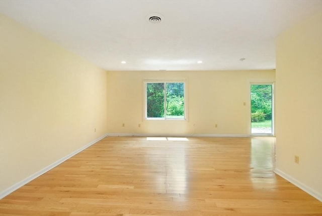 19 Concord Greene Unit 3, Concord, MA 01742 - empty room with plenty of natural light, light wood-style floors, and recessed lighting