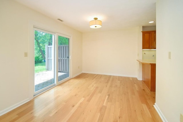 19 Concord Greene Unit 3, Concord, MA 01742 - unfurnished room with light wood finished floors and recessed lighting