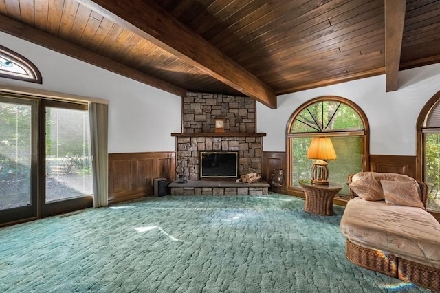 242 Eastwood Dr, Westfield, MA 01085 - living area with beam ceiling, a wainscoted wall, a fireplace, carpet flooring, and wooden ceiling