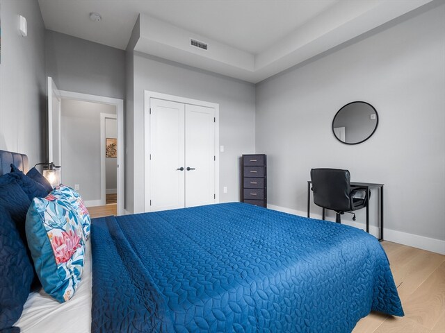 bedroom featuring light wood-type flooring