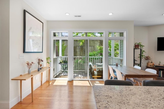 129 Highland Ave Unit 4, Somerville, MA 02143 - dining area featuring wood finished floors and recessed lighting
