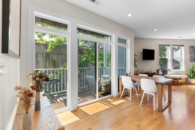 129 Highland Ave Unit 4, Somerville, MA 02143 - dining area with light wood-style floors and recessed lighting