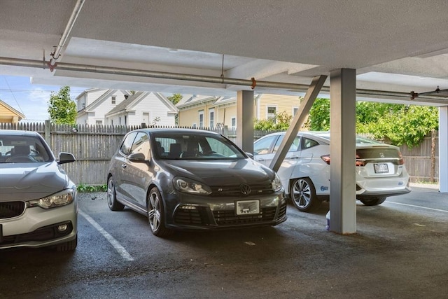 129 Highland Ave Unit 4, Somerville, MA 02143 - garage featuring a parking lot