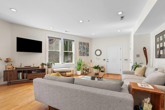 129 Highland Ave Unit 4, Somerville, MA 02143 - living room featuring light wood-style flooring and recessed lighting