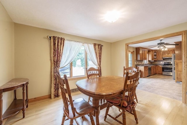 1170 E St, Ludlow, MA 01056 - dining area featuring light wood finished floors and a ceiling fan