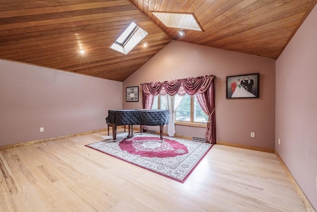 1170 E St, Ludlow, MA 01056 - living area featuring a skylight, lofted ceiling, wood finished floors, and wooden ceiling