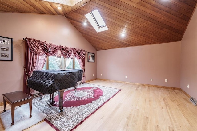 1170 E St, Ludlow, MA 01056 - sitting room featuring a skylight, wood ceiling, lofted ceiling, and wood finished floors