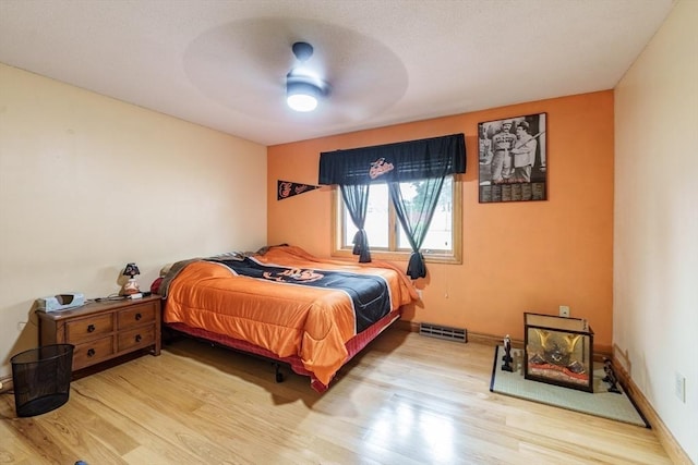 1170 E St, Ludlow, MA 01056 - bedroom with wood finished floors and ceiling fan