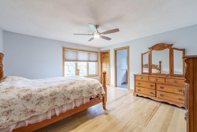 1170 E St, Ludlow, MA 01056 - bedroom featuring light wood-type flooring, ceiling fan, and a textured ceiling